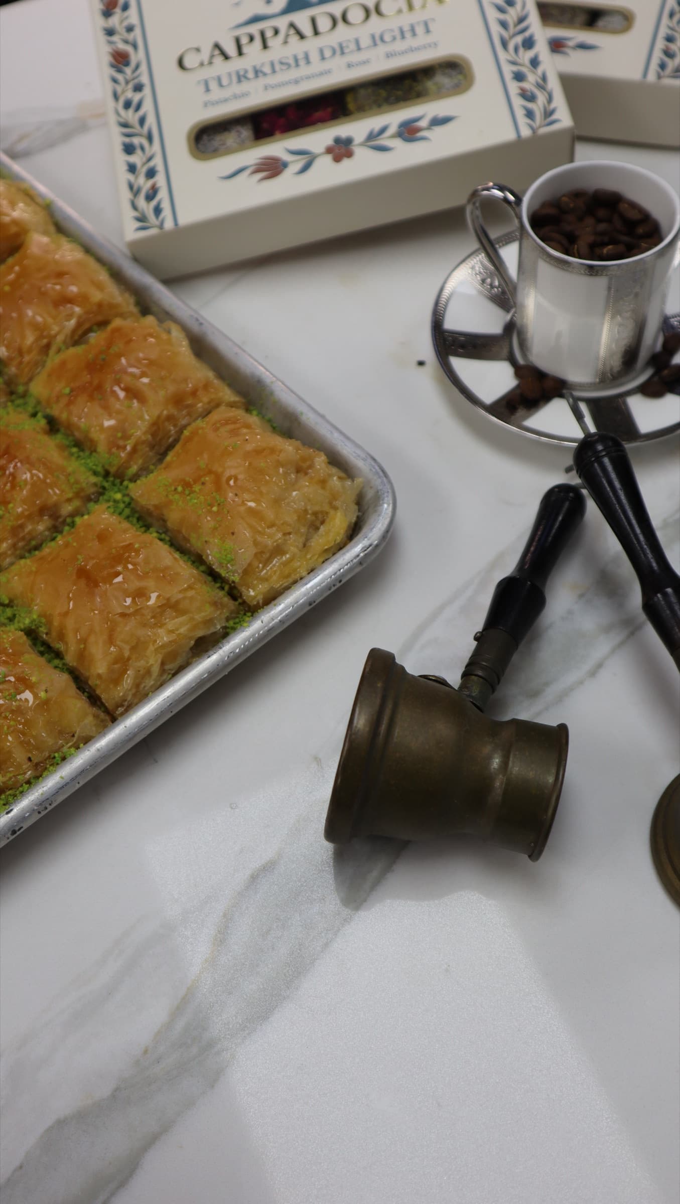 Baklava with Turkish coffee and a copper cezve