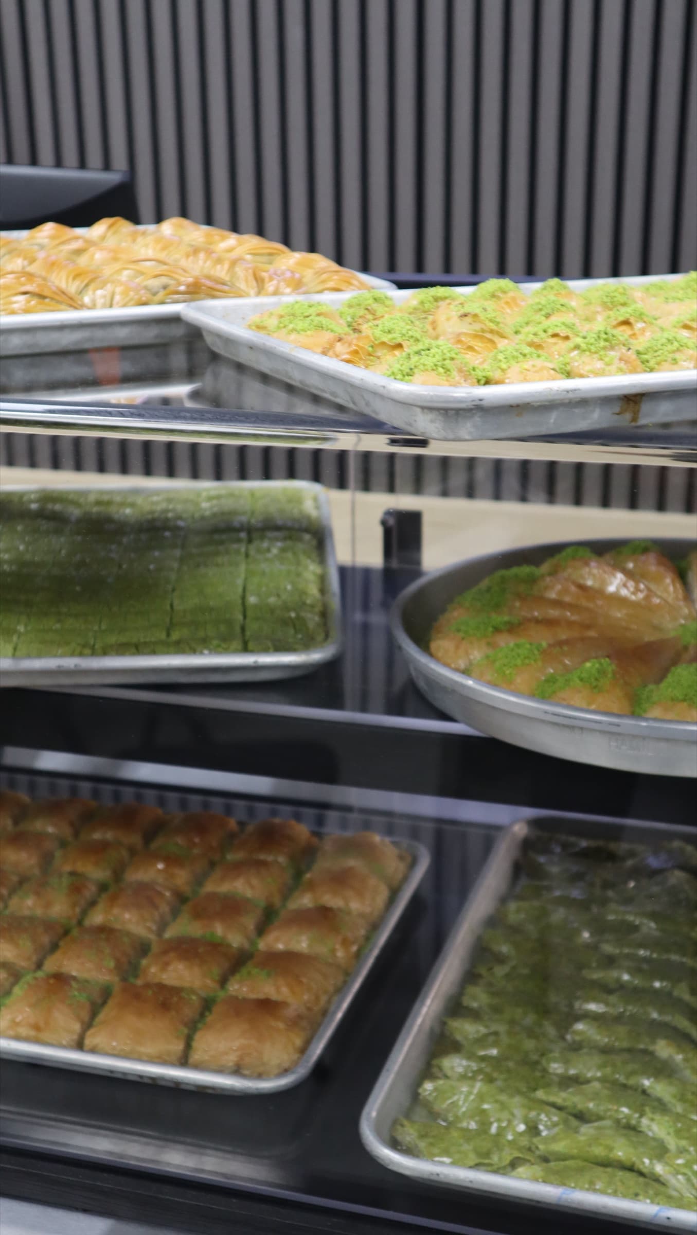 Trays of baklava in the dessert case